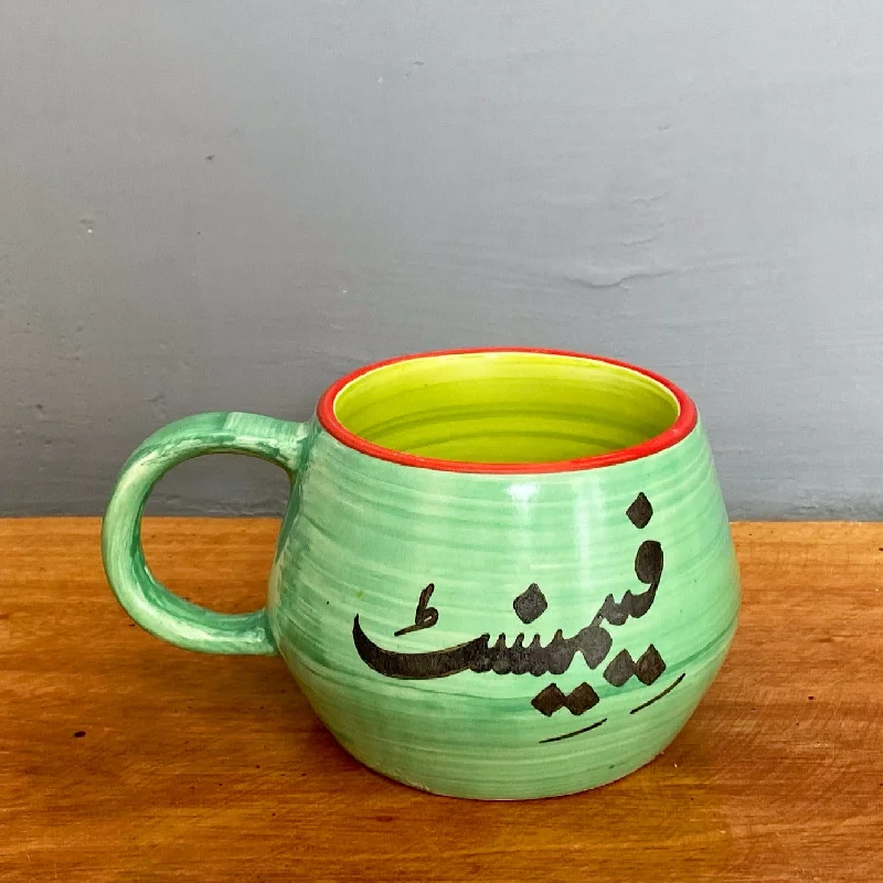 Shatter-resistant glass cups-Feminist Malmo mug in sea green & lime green