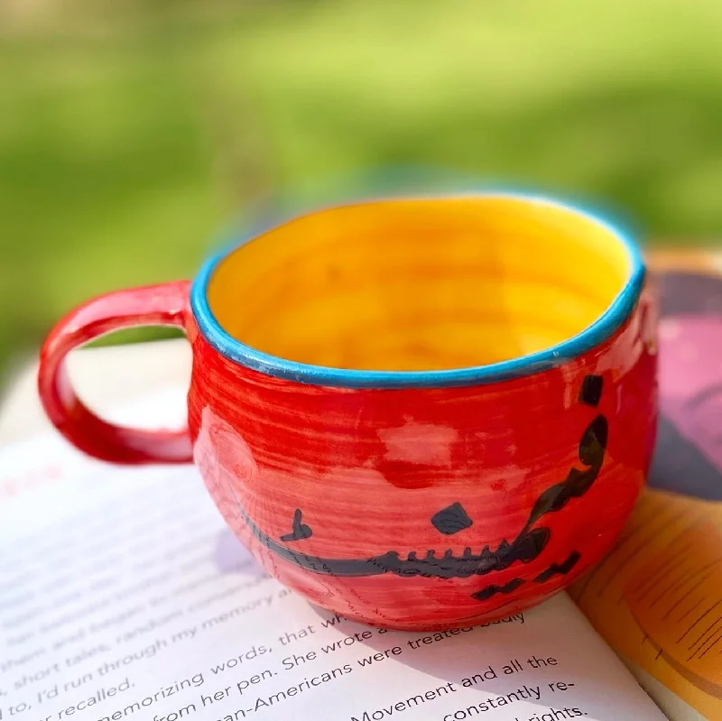 Novelty shaped coffee mugs-Feminist wobbly mug in red. These mugs are hand built so each mug will be different in its crookedness and wobbliness. No two are the same.