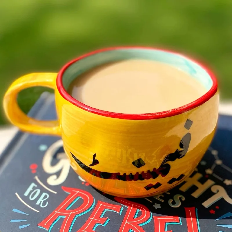 Shatterproof plastic wine cups-Feminist wobbly mug in yellow. These mugs are hand built so each mug will be different in its crookedness and wobbliness. No two are the same.